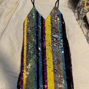 Very cute brand new dress. Size medium. Multi-color